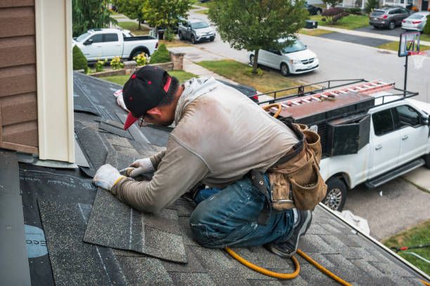 Professional Emergency Roof Repair technician working in Russellville, AL